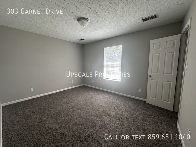 Building Photo - 303 Garnet Dr