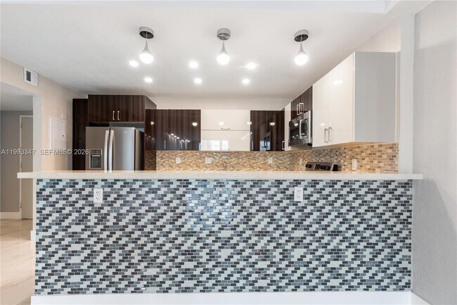 Building Photo - 19380 Collins Ave