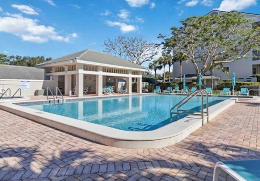 Resort style heated pool with bath house - 1001 Arbor Lake Dr