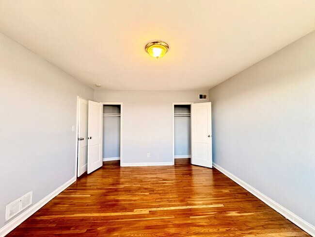 Building Photo - Charming Brick Home with Finished Basement, Modern Kitchen & Spacious Yard