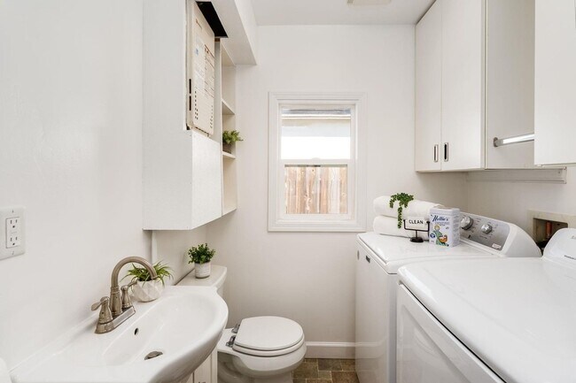 Building Photo - Light-Filled San Leandro Gem w/ Dual Garages & Expansive Yard