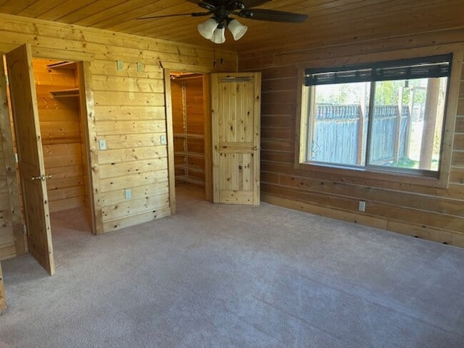 Building Photo - Gorgeous Log Home with infloor heat.  Two level lots with RV parking and dumpstation.