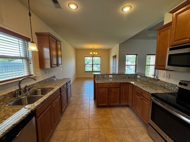 Building Photo - Available now in amazing location