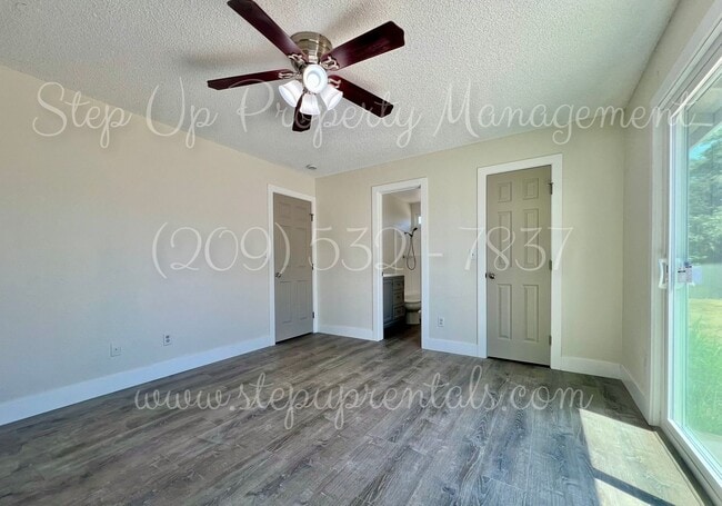 Building Photo - Beautifully Updated 4-Bedroom Home on Half...