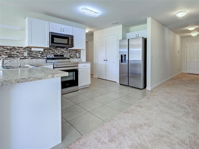 Building Photo - 5442 Guidepost Terrace