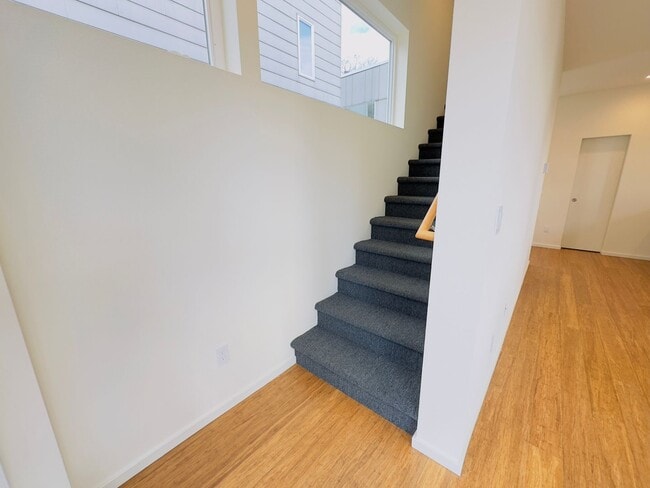 Building Photo - 3 Bedroom Central District Townhome w/ Garage, AC & Rooftop Deck