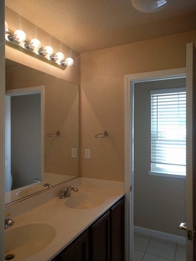 Building Photo - Gated Community Stunner ready to be called home