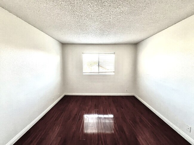 Building Photo - 2 Bedroom, 2 Bath Upstairs Condo with Private Balcony & 2-Car Garage, Gated Community, Water/Tras...