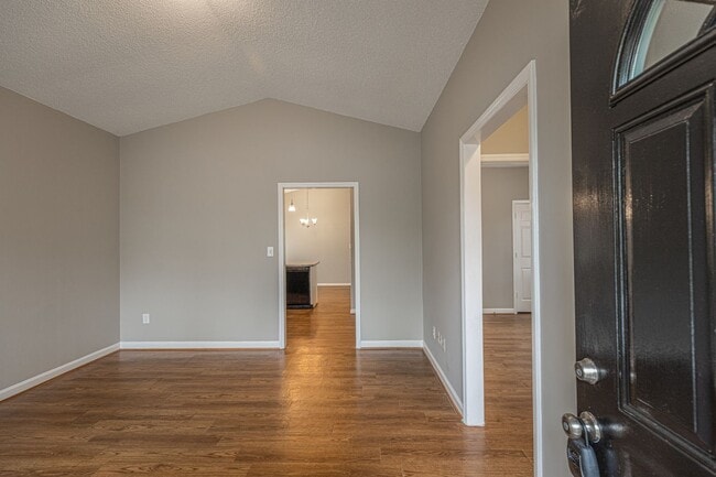 Building Photo - Like New Home off Freeman Mill.  Just Painted, New Wood/Vinyl Flooring, Vaulted Ceilings, Front P...