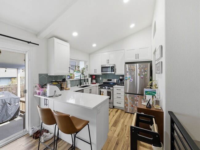 Building Photo - Bright Ranch Home with 2-Car Garage, Finished Basement, and Spacious Yard