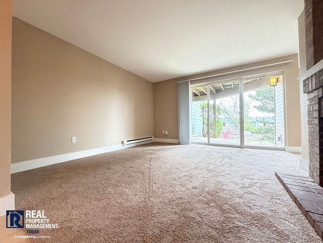 Building Photo - Updated 2 Bed Condo Near the Narrows – Water Views, Covered Parking & Prime Tacoma Location!