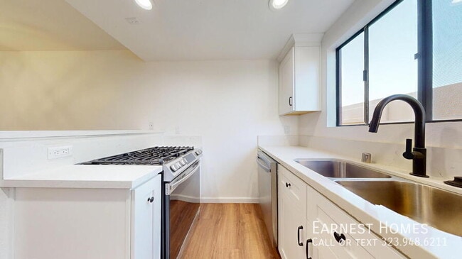 Building Photo - 10220 De Soto Ave