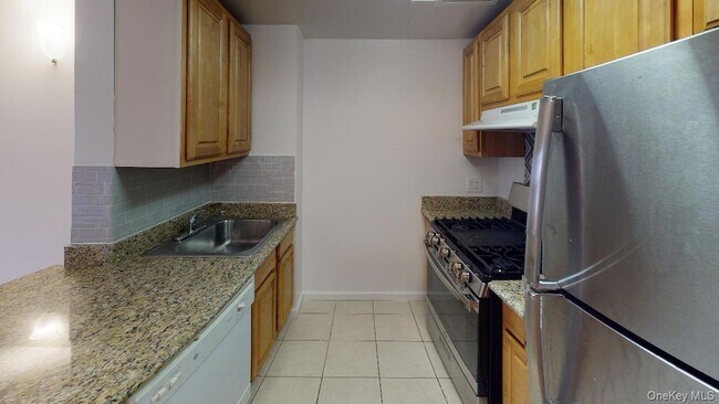 Building Photo - 102-30 Queens Blvd