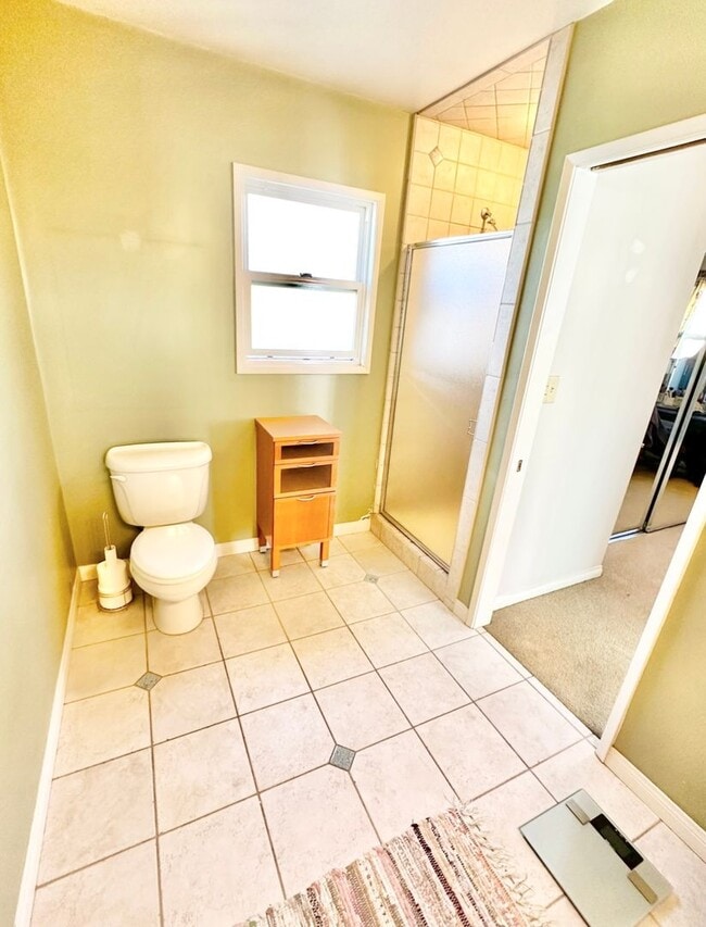 Building Photo - 3 Bedroom 2 Bathroom Lakewood House with Private Backyard down the street from Lakewood High School