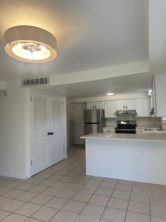 Building Photo - Welcome to this beautiful 4-bedroom, 2.5-b...