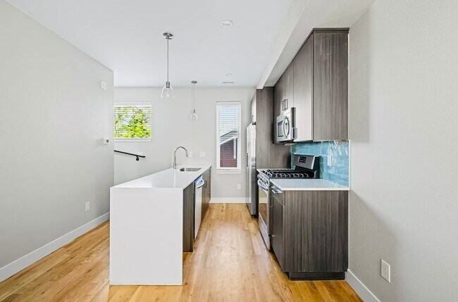 Experience the elegance of this modern kitchen, perfect for culinary creativity. - Harley House