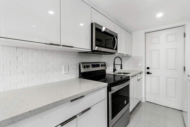 Building Photo - Live in this newly renovated two-story cor...