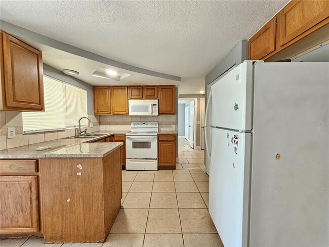 Building Photo - 9210 Pegasus Ave