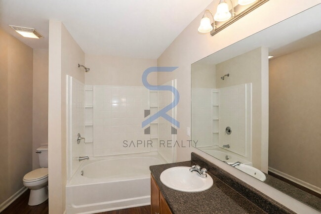 Building Photo - Move in before February 28th and choose your reward: a $250 Amazon Gift Card or a 55" Smart TV!