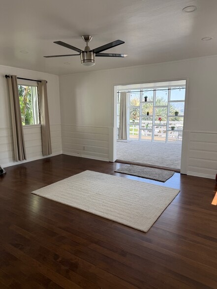 Living Room refinished hardwood flooring - 518 1/2 Crane Blvd