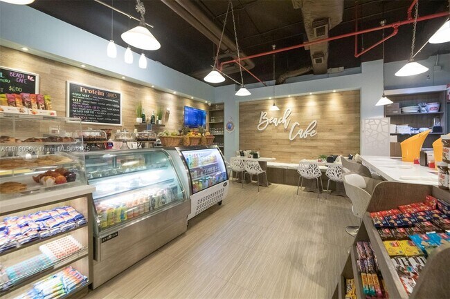 Building Photo - 10275 Collins Ave