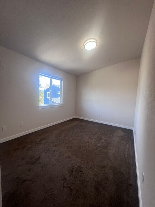 Building Photo - 2 Bedroom 1 bath house with extra large double car garage and extra storage space!