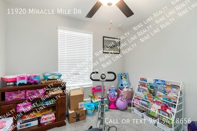 Building Photo - 11920 MIracle Mile Dr-