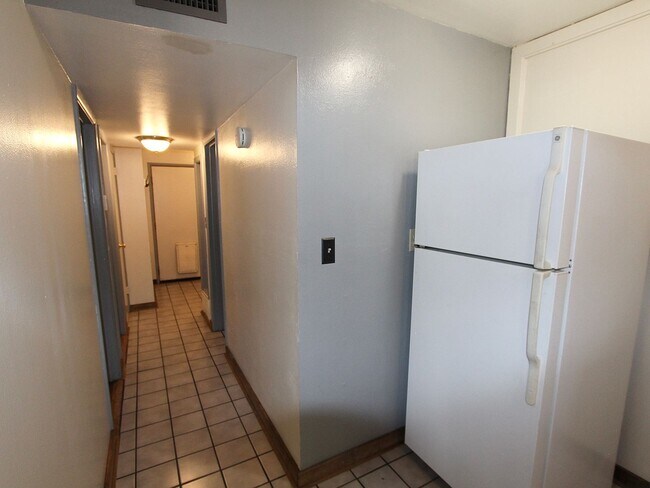 Building Photo - *LEASE TAKEOVER* Single Level 2BR Flagstaff Home | Fenced Yard & In-Unit Laundry