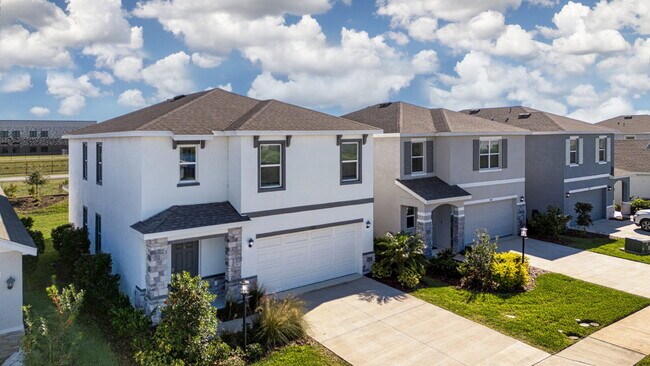 Building Photo - Spacious 5-Bed Retreat with Granite Elegance in Lakewood Ranch
