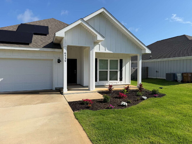 Building Photo - "Charming 4-Bed Oasis with Granite Touches in Gulf Breeze – Electricity Included   !"