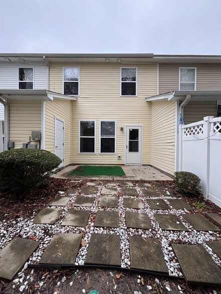 Extended back patio with storage closet - 190 Olde Towne Way