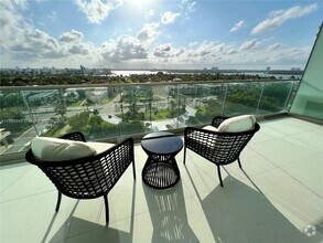 Building Photo - 10201 Collins Ave