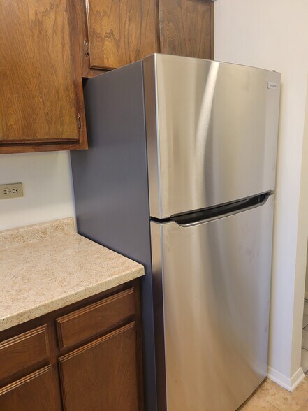 New SS Fridge - 8613 W Foster Ave