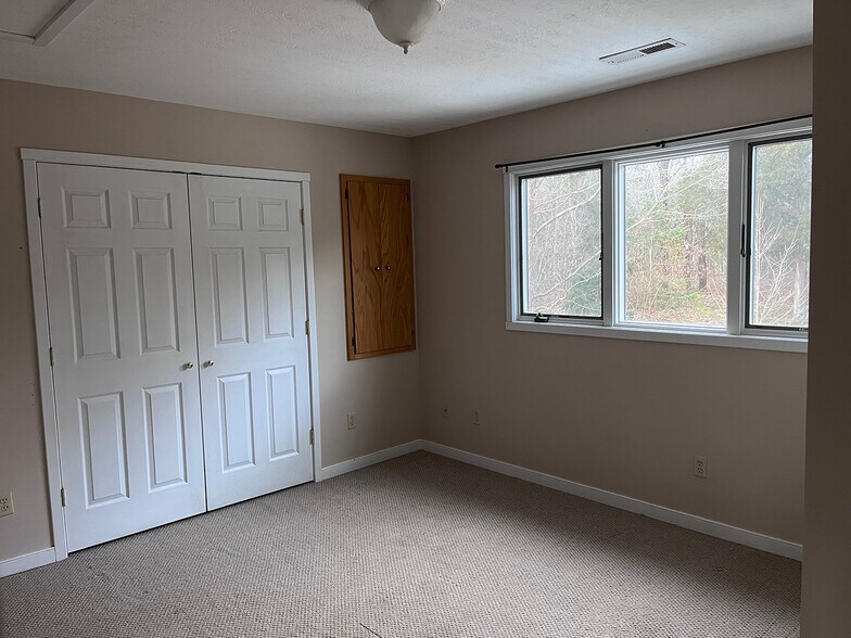 Bedroom 2 (forest view). - 2353 Lusters Gate Rd