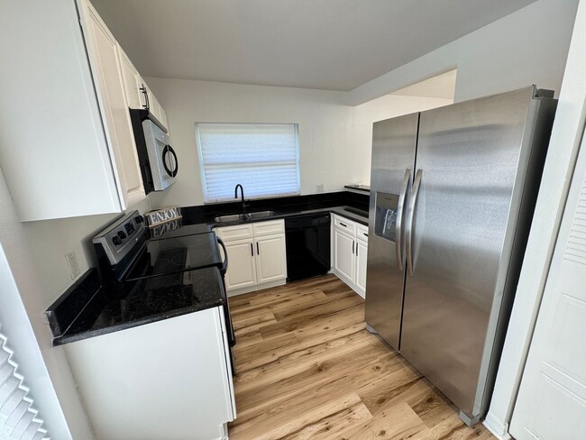 Building Photo - Cozy 2 Bedroom and 2 Bath Townhome in Kiss...