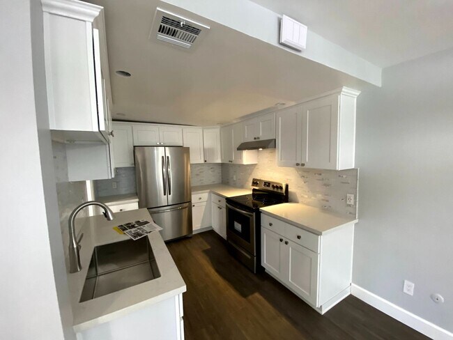 Building Photo - Coming Soon: Stylish 2-Bed Apartment with Underground Parking