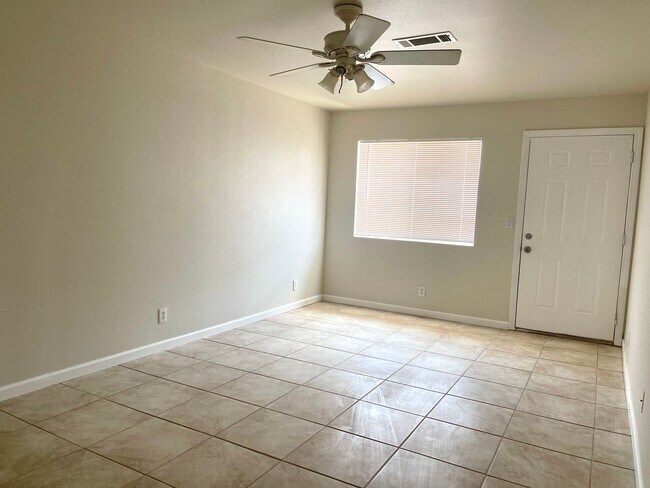 Building Photo - READY NOW! 3+2 with garage and large fenced backyard