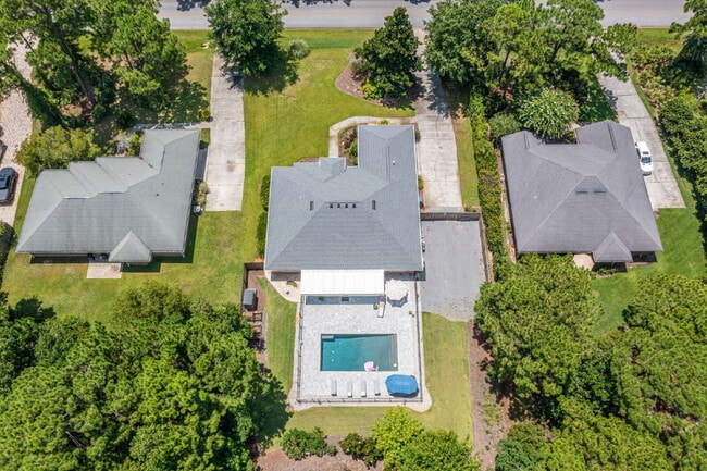 Building Photo - "Coastal Elegance Awaits: Spacious 4-Bed Oasis with $400.00 Off First Full Months Rent!"