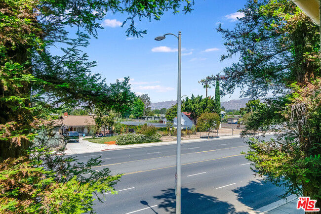 View from the windows - Nursery across the street - so no one will block your beautiful view. - 7800 Topanga Canyon Blvd