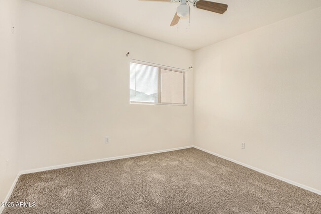 Building Photo - 15554 W Gelding Dr