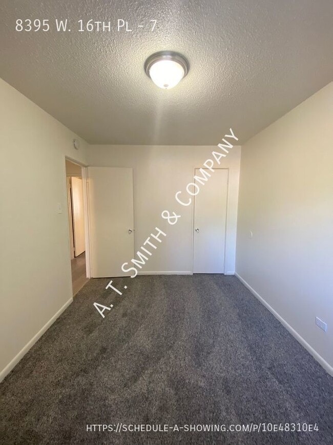 Building Photo - 8395 W 16th Pl