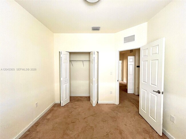 Building Photo - 9271 W 33rd Ln