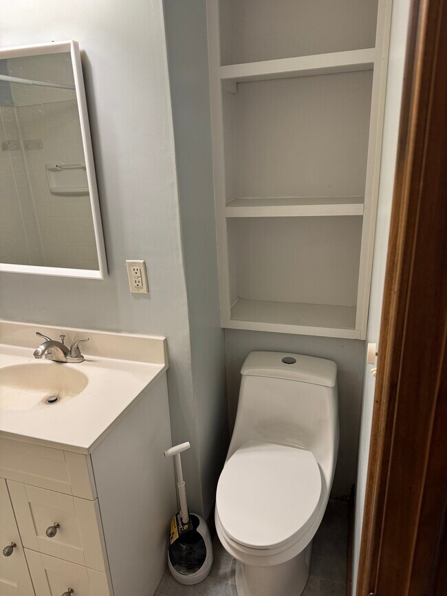 New Toilet & Overhead Storage - 3900 W 11th St