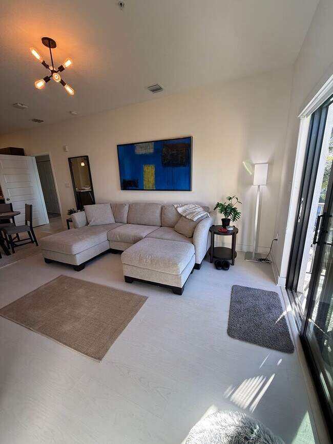 Building Photo - Premium Lake-View URBANA Residence Steps from Downtown Doral