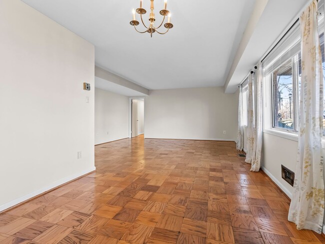 Building Photo - Commuter’s Dream! Large 2BR/2BA Condo Steps from Metro – All Utilities Included!