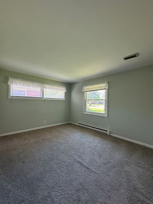 Building Photo - Not Your Typical Rental — Warm, Welcoming 3BR Brick Ranch in a Prime Neighborhood