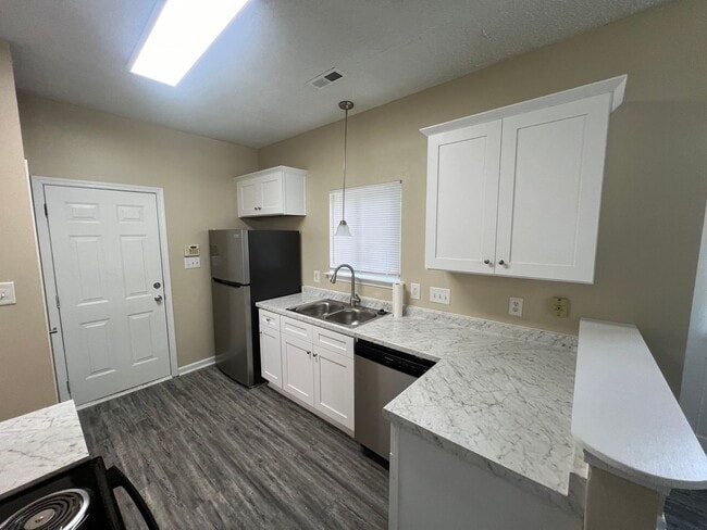 Building Photo - Welcome to Timbertop5127, a well-appointed 4-bedroom, 2.5-bath home in Charlotte, NC.