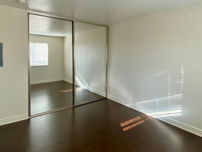 Building Photo - Bright Remodeled Upstairs Condo in Santa C...