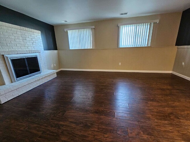 Building Photo - Clean 3-Bedroom Tri-Level, 1.5 Bath with Updated Kitchen, Great Room, Fireplace & Private Backyar...