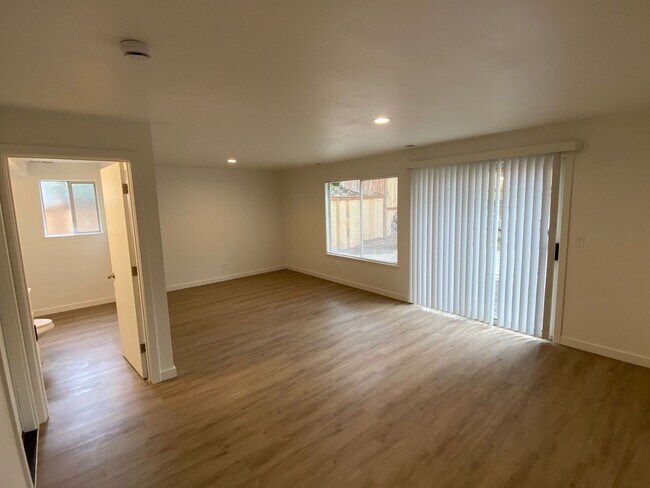 Building Photo - Stylishly Renovated Home with Private Back...